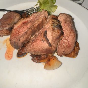 The Capital Grille - Sliced Filet Mignon with Cipollini Onions, Wild Mushrooms and Fig Essence - Steakhouses Near Me - Miami, Florida