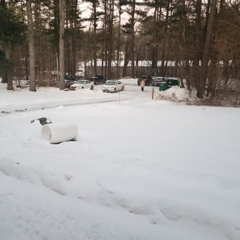 Ulster Property Services - a snow covered parking lot - Landscaping Near Me - Bedford, New Hampshire