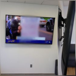 Phase One Cabling - Another TV mounting well done. #cardealer, # fullmotionmount