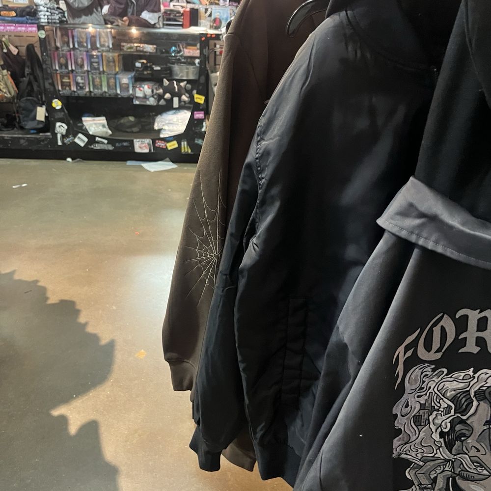 Zumiez - Employee watching videos - Women's Clothing Near Me - Round Rock, Texas