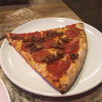 Cosa Nostra Pizzeria - Pepperoni and sausage slice - Pizza Near Me - San Antonio, Texas Cosa Nostra Pizzeria - Pepperoni and sausage slice - Pizza Near Me - San Antonio, Texas