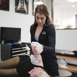 Streamline Performance Physical Therapy - Dr. Lauren Mueller working with a client.