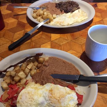 La Parrillada - The Bfast special and Chilaquiles plate...the bacon was over cooked but they replaced it ...it didn't last long enough to take a pic!!! - Tex-Mex Near Me - San Antonio, Texas