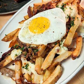 Union Restaurant - Duck confit poutine - Cocktail Bars Near Me - Portland, Maine Union Restaurant - Duck confit poutine - Cocktail Bars Near Me - Portland, Maine