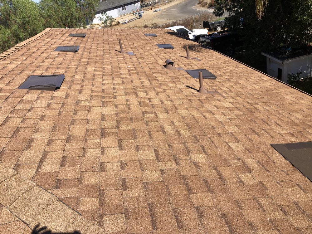 Slide of Escamilla’s Roofing and Rain Gutters