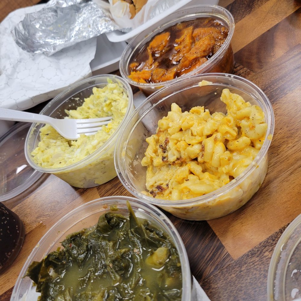 The sides we decided to share: greens, mac and cheese, sweet potatoes, and potato salad The sides we decided to share: greens, mac and cheese, sweet potatoes, and potato salad
