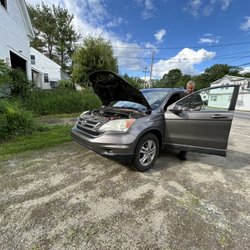 Diamond Auto Repair - Chris helping with our Honda.