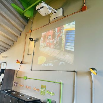 Lloyd Taco Factory - Projector playing cartoons - Tacos Near Me - Williamsville, New York Lloyd Taco Factory - Projector playing cartoons - Tacos Near Me - Williamsville, New York