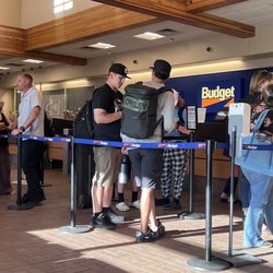 Budget Rent A Car - The line at Budget Albuquerque international. One person working because the only other one took a break!