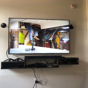 Aponte Home Remedy - Large TV and floating tv stand installed - TV Mounting Near Me Aponte Home Remedy - Large TV and floating tv stand installed - TV Mounting Near Me