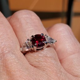 1.5 carat lab created rubygemstone, .40 carat lab grown diamonds, 14k white gold in Emery setting. 1.5 carat lab created rubygemstone, .40 carat lab grown diamonds, 14k white gold in Emery setting.