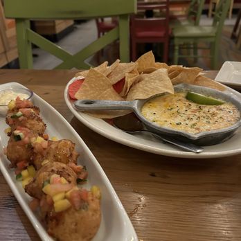 Bahama Breeze - Crispy Conch Fritters, Crab and Three Cheese Dip - Bars Near Me - Gainesville, Florida Bahama Breeze - Crispy Conch Fritters, Crab and Three Cheese Dip - Bars Near Me - Gainesville, Florida