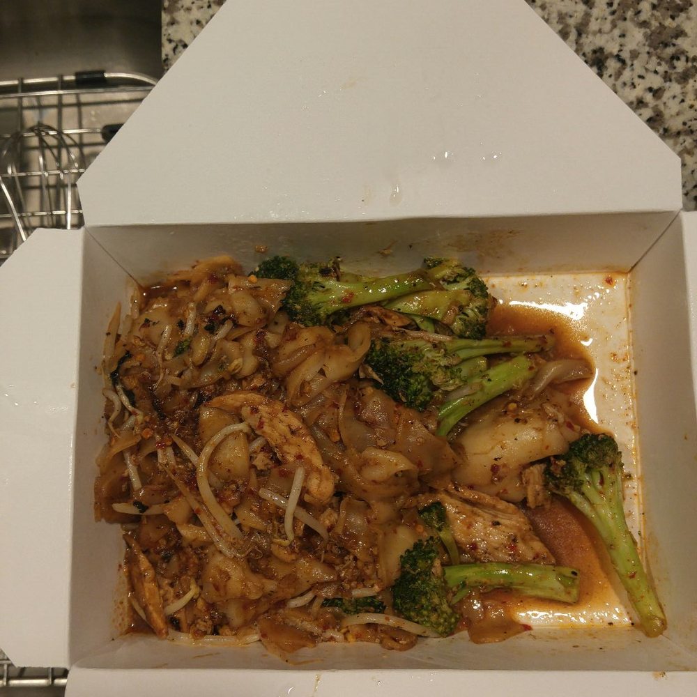 Pad see ew, upon opening the container. Looked like a partial order... Small portions here Pad see ew, upon opening the container. Looked like a partial order... Small portions here