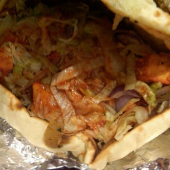 Chutney's - Chicken tikka on nan with lettuce, rice and onion - Indian Near Me - Cambridge, Massachusetts Chutney's - Chicken tikka on nan with lettuce, rice and onion - Indian Near Me - Cambridge, Massachusetts