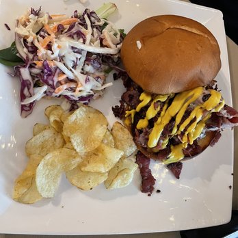 Stomping Grounds Grille - Pastrami Sandwich with a side of close slaw & chips - New American Near Me - Buzzards Bay, Massachusetts