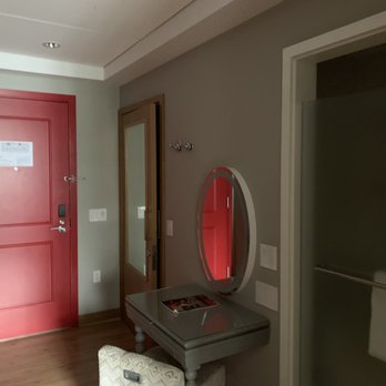 Virgin Hotels Chicago - Shower area, make up table, toilet, and front door. - Hotels Near Me - Chicago, Illinois Virgin Hotels Chicago - Shower area, make up table, toilet, and front door. - Hotels Near Me - Chicago, Illinois