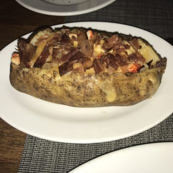 Ocean Prime - Lobster loaded baked potato. Definitely sounded better than it actually was. - Seafood Near Me - Beverly Hills, California Ocean Prime - Lobster loaded baked potato. Definitely sounded better than it actually was. - Seafood Near Me - Beverly Hills, California