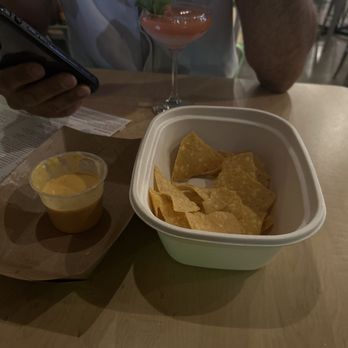 Taco Bamba Richmond - The chips and queso with their signature mango margarita. - Tacos Near Me - Richmond, Virginia