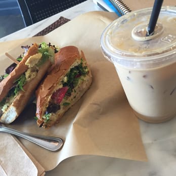 Romancing the Bean Cafe - My usual chicken curry sandwich on baguette (usually get sourdough though) and an iced latte w/ a splash of vanilla & hazelnut. - Coffee & Tea Near Me - Burbank, California Romancing the Bean Cafe - My usual chicken curry sandwich on baguette (usually get sourdough though) and an iced latte w/ a splash of vanilla & hazelnut. - Coffee & Tea Near Me - Burbank, California
