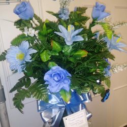 Flower Shop - Thank you for putting this beautiful arrangement together for a funeral. The florist was wonderful & was very helpful.