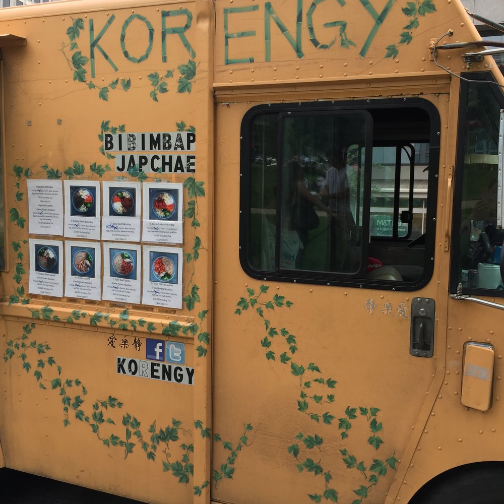 Korengy - a yellow food truck parked on the side of the road - Food Trucks Near Me