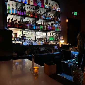 The James Room - a bar with liquor bottles on the shelves - Cafes Near Me - Atlanta, Georgia The James Room - a bar with liquor bottles on the shelves - Cafes Near Me - Atlanta, Georgia