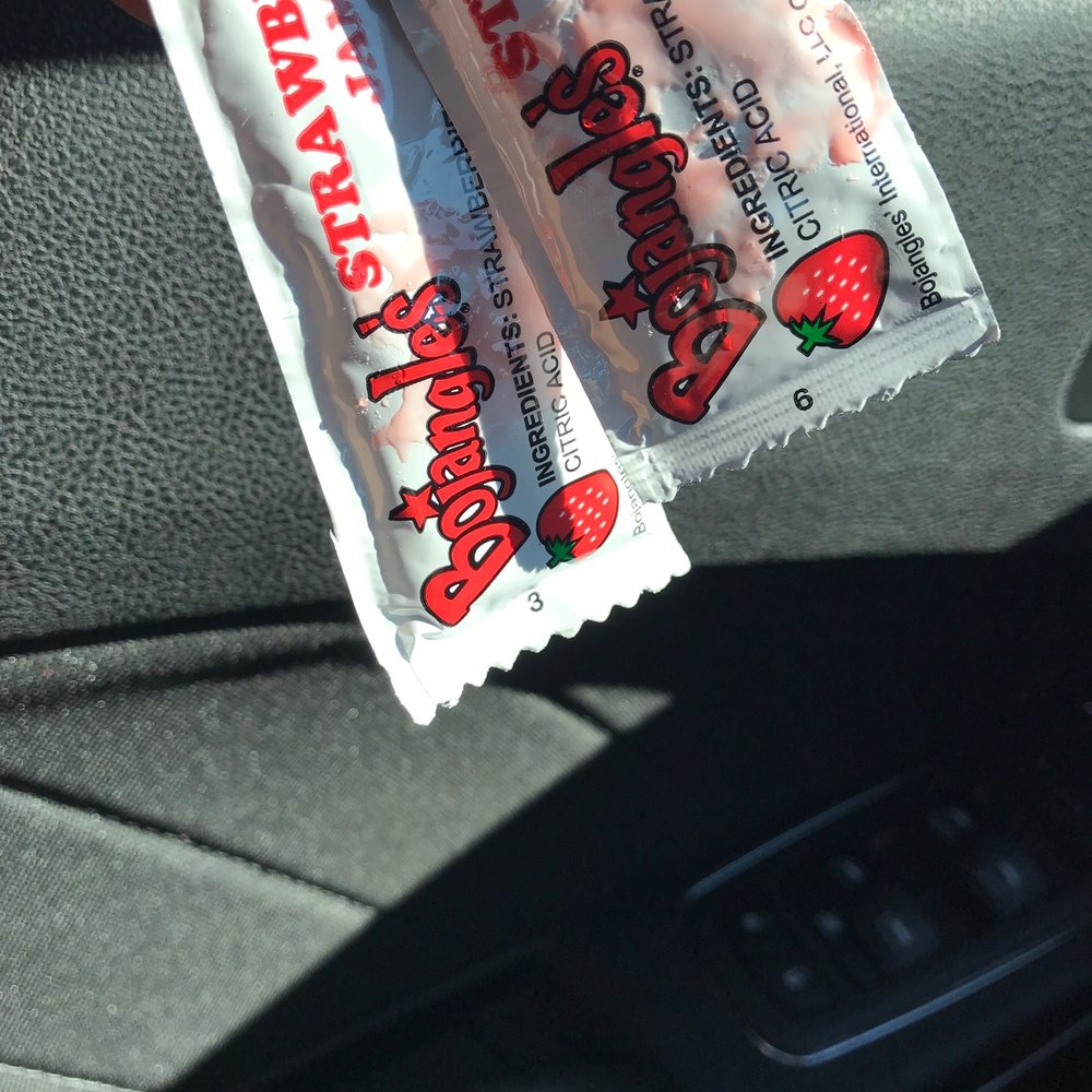 Bojangles - a hand holding two packets of bojangles - Fast Food Near Me - Mccalla, Alabama Bojangles - a hand holding two packets of bojangles - Fast Food Near Me - Mccalla, Alabama