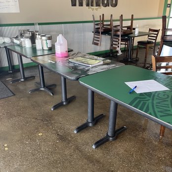 Wingstop - tables and chairs in a restaurant - Chicken Wings Near Me - Cleveland, Ohio Wingstop - tables and chairs in a restaurant - Chicken Wings Near Me - Cleveland, Ohio