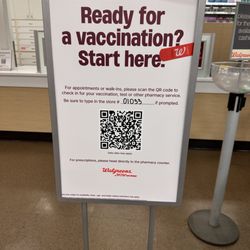 Walgreens - Here's the sign. Follow the QR code and it will instruct you to check in and then sit down and wait for them to call your name. Don't do it!