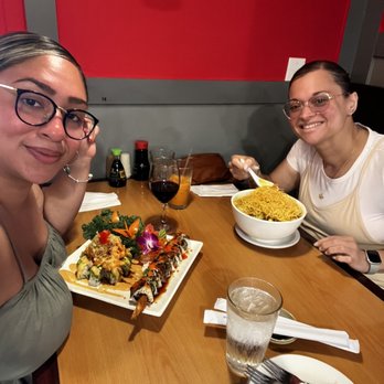 Basil Leaf - My sister enjoying a Khao Soi (Coconut Curry Noodles with Chicken) - Sushi Bars Near Me - St. Pete Beach, Florida