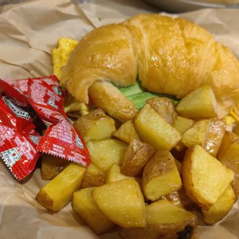 New Belgium Brewing - Croissant sandwich egg and sausage with potatoes added avocado but it should have came with . - Beer Bar Near Me - Denver, Colorado New Belgium Brewing - Croissant sandwich egg and sausage with potatoes added avocado but it should have came with . - Beer Bar Near Me - Denver, Colorado