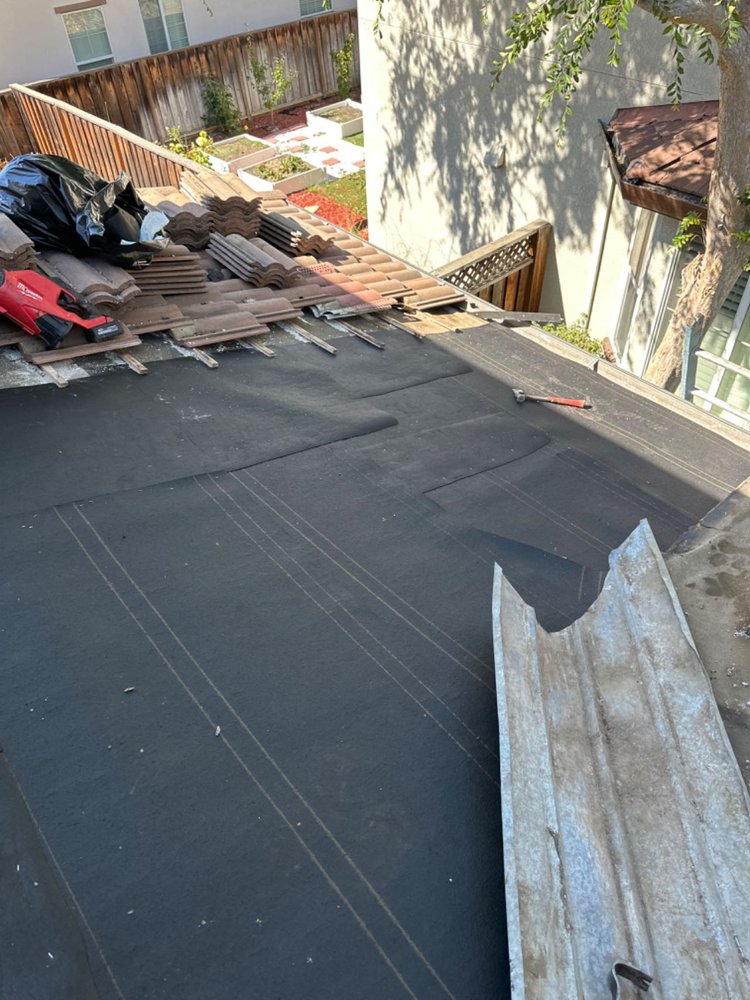 Slide of Aguilar Roofing