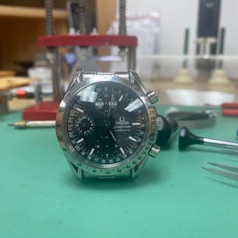 Bentley Watch Repair - Face change on Omega Speedmaster Triple Date. Changed white face to a black face - Watch Repair Near Me - Hiawatha, Iowa Bentley Watch Repair - Face change on Omega Speedmaster Triple Date. Changed white face to a black face - Watch Repair Near Me - Hiawatha, Iowa