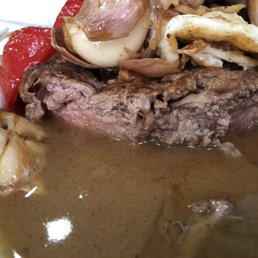I ordered a medium rare steak and got this over cooked thing. I ordered a medium rare steak and got this over cooked thing.