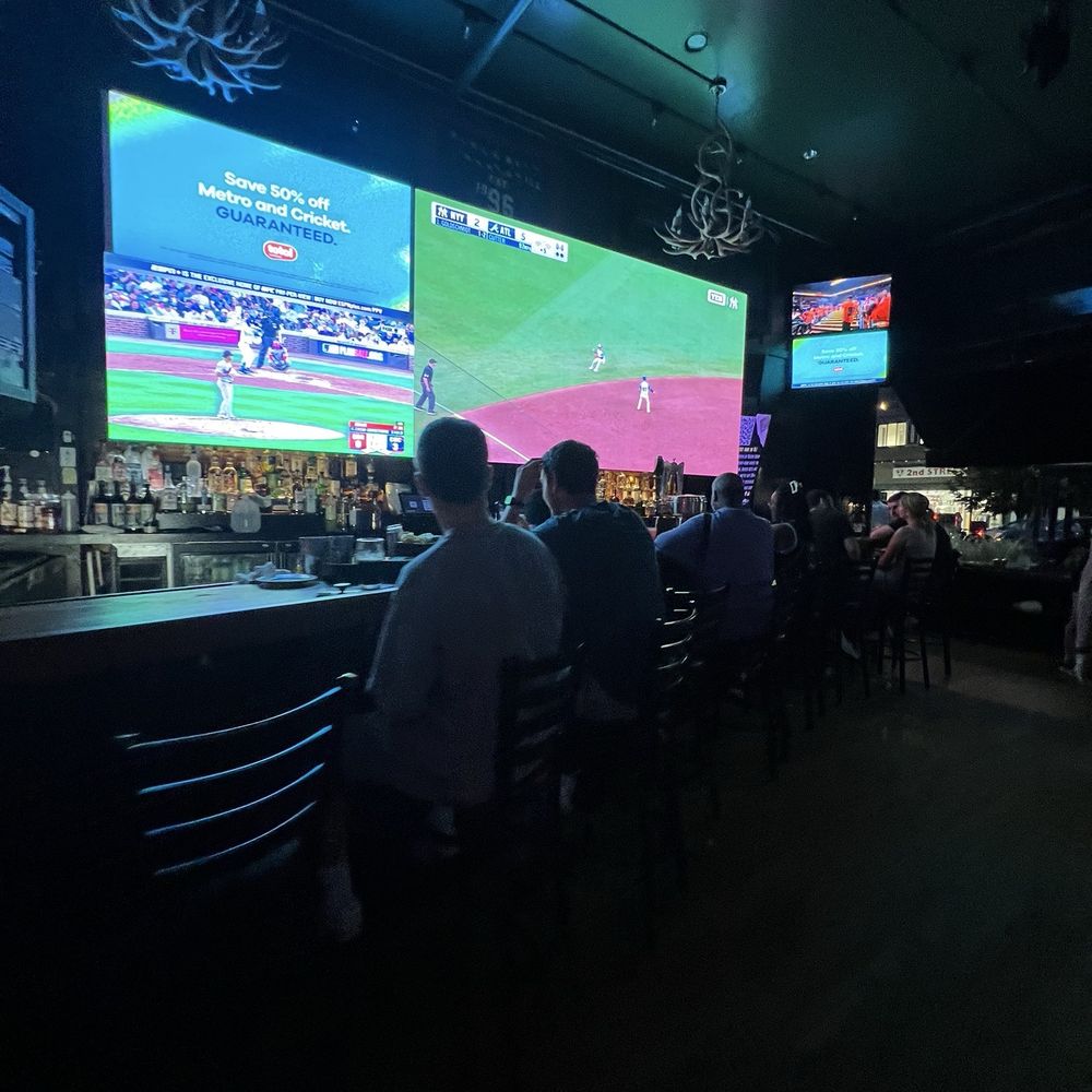 Black Bear Bar & Grill - Bar area on first floor - Sports Bars Near Me - Hoboken, New Jersey