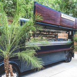 RoadHaus Mobile Cocktails - Step on up to the mahogany bar rail and order a drink from our expansive cocktail menu.
