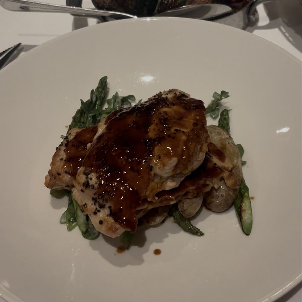 The Capital Grille - Roasted Chicken Breast with Mushrooms and Parmesan Risotto - Steakhouses Near Me - Burbank, California The Capital Grille - Roasted Chicken Breast with Mushrooms and Parmesan Risotto - Steakhouses Near Me - Burbank, California