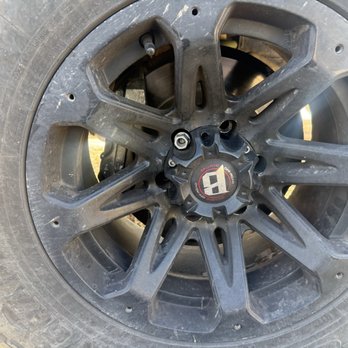 Discount Tire - Right after I took this photo I picked up the lug nut visible, and the wheel stud was still attached to the lug nut. - Tires Near Me - Roswell, New Mexico