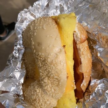 The Cleveland Bagel - Cheese, bacon, egg on a sesame bagel. - Bagels Near Me - Cleveland, Ohio