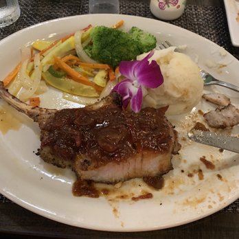 Brisas - Cheshire Pork Chop - Caribbean Near Me - Goldsboro, North Carolina