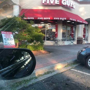 Five Guys - a car parked in front of a five guys store - Burgers Near Me - Charlotte, North Carolina Five Guys - a car parked in front of a five guys store - Burgers Near Me - Charlotte, North Carolina