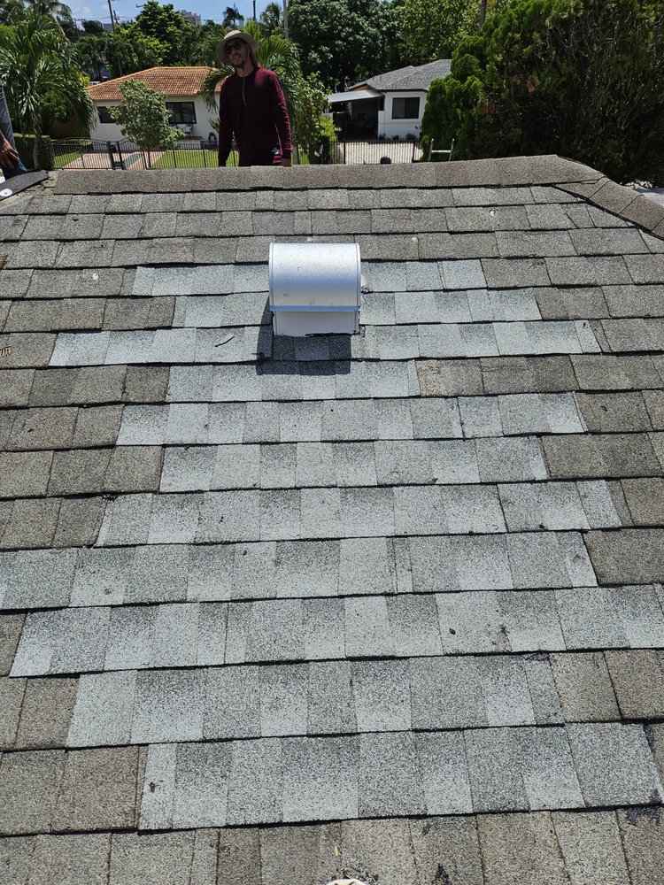 Slide of Sarmiento Roofing Services