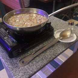 Bananas Foster just before serving over ice cream Bananas Foster just before serving over ice cream