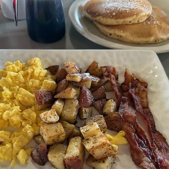 Cleaver's - Eye Opener - Two eggs scrambled, home fries, bacon and pancakes - Sandwiches Near Me - Evansville, Indiana