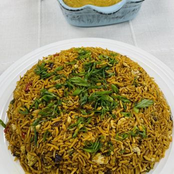 Curry Hub - a plate of rice and a bowl of soup - Caterers Near Me - Hayward, California