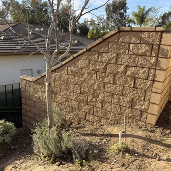 Sandstone Construction - Wall extending up hill. - Masonry/Concrete Near Me Sandstone Construction - Wall extending up hill. - Masonry/Concrete Near Me
