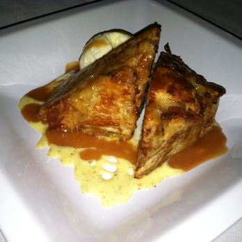 Bouquet Restaurant - Croissant bread pudding with bourbon sauce - Bars Near Me - Covington, Kentucky