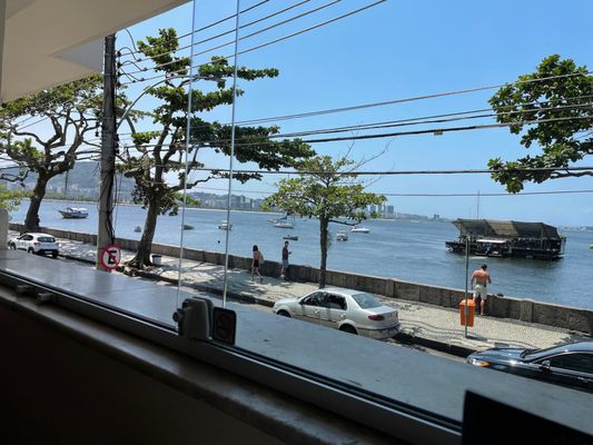 Photo of Bar Urca - Rio de Janeiro, RJ, BR. View from the window, on a sunny weekday. It gets much busies on weekends and evenings.