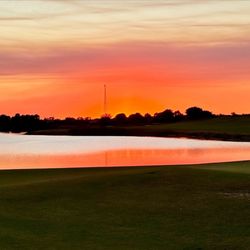 Duran Golf Club - Walking off 18th green at sunset