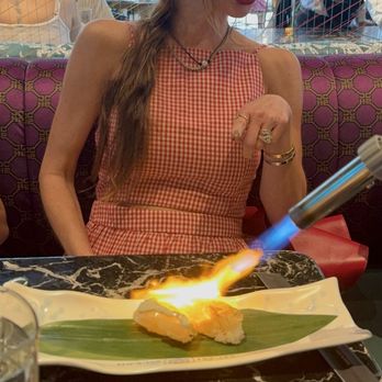 Ceviche 105 - My sweet sister making friends with other guests in the restaurant - Peruvian Near Me - Boca Raton, Florida